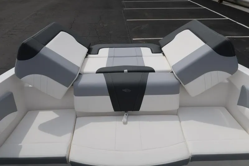 Slide: The Image of 2025 Chaparral 21 SSi boat interior with gray and white seating. - 39