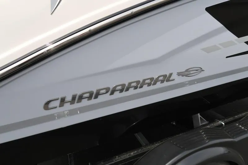 Slide: The Image of 2025 Chaparral 21 SSi boat logo on sleek hull design. - 4