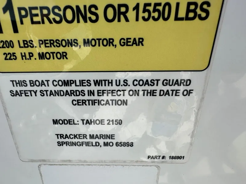 Slide: The Image of 2016 Tahoe 2150 Deck Boat compliance label with U.S. Coast Guard safety standards. - 14