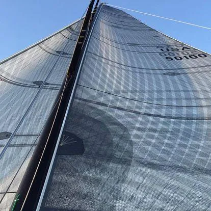 Slide: The Image of Close-up of a sail on a Custom Modified In 2003 SLP 52 yacht, 1989 model. - 12