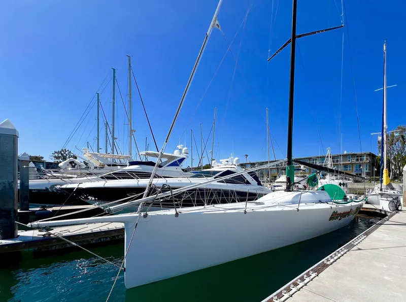 Slide: The Image of Sailboat docked at marina, Custom Modified In 2003 SLP 52, 1989 model. - 8