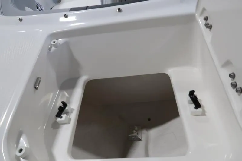 Slide: The Image of 2025 Chaparral 23 SSi boat storage compartment, open and empty. - 10