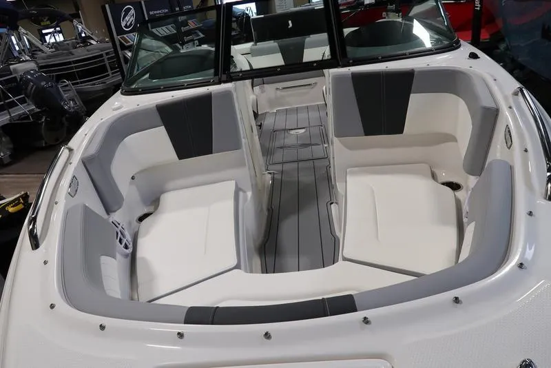 Slide: The Image of 2025 Chaparral 23 SSi boat interior with spacious seating and modern design. - 11