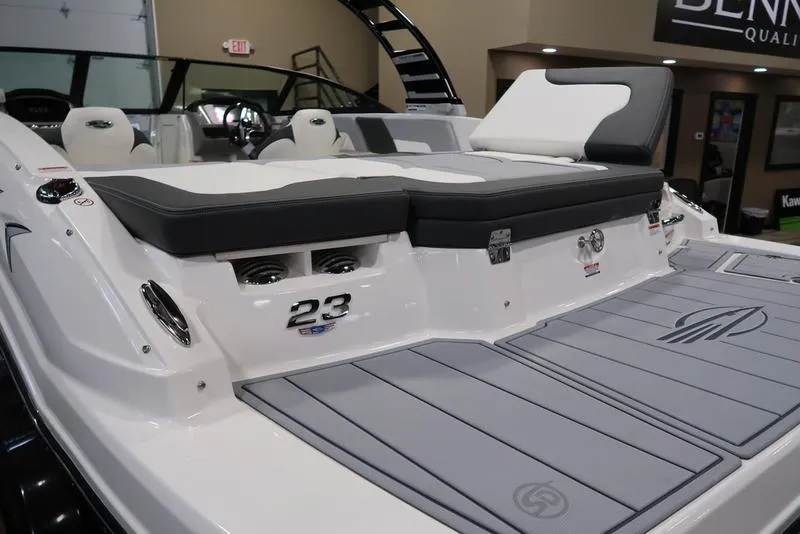 Slide: The Image of 2025 Chaparral 23 SSi boat with sleek design and spacious seating area. - 6
