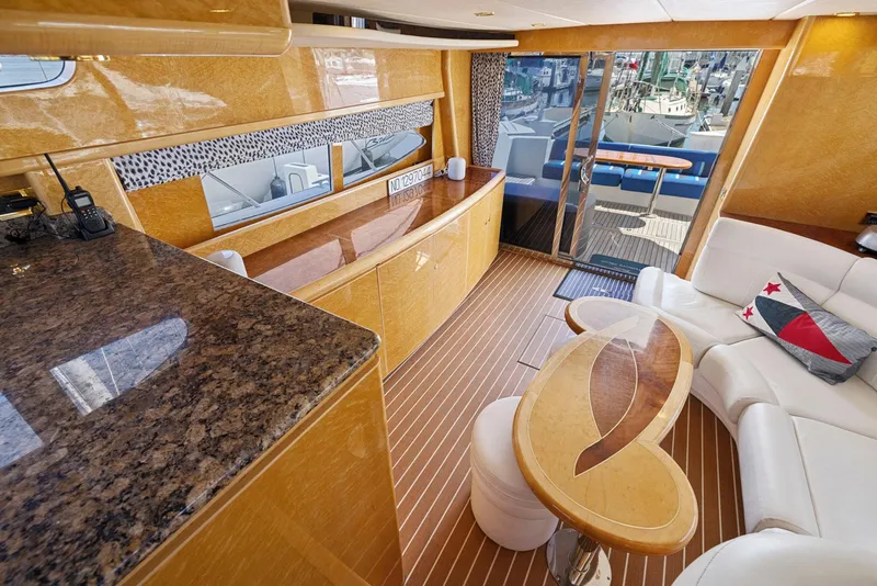 Slide: The Image of Luxurious interior of 2008 Dyna 51 yacht with elegant wood finishes and modern furnishings. - 31