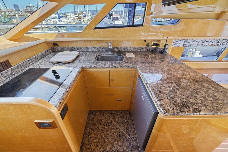 Slide: The Image of Luxurious kitchen interior of 2008 Dyna 51 yacht with granite countertops and modern appliances. - 32