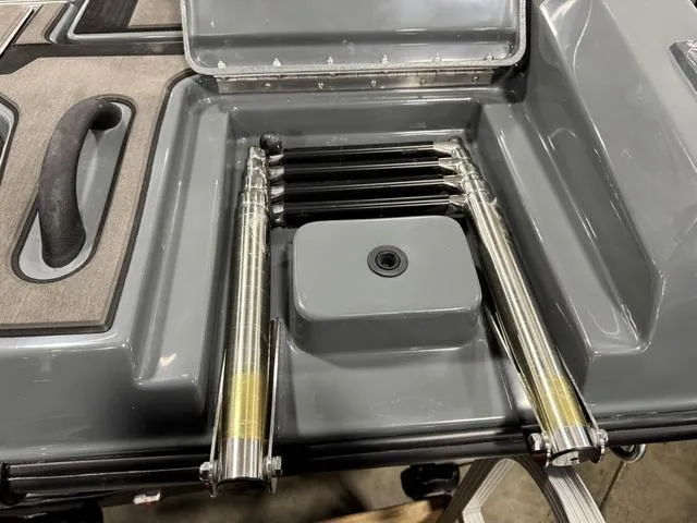 Slide: The Image of 2025 Lund 185 Impact GL Sport boat ladder and storage compartment detail. - 14