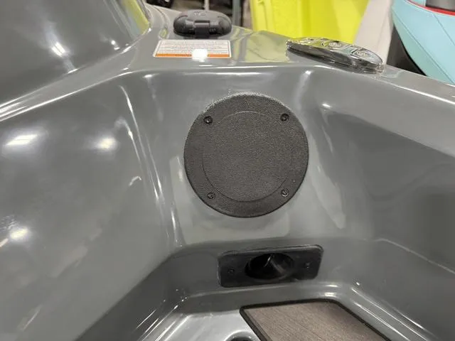 Slide: The Image of 2025 Lund 185 Impact GL Sport boat interior, featuring a sleek gray panel design. - 34