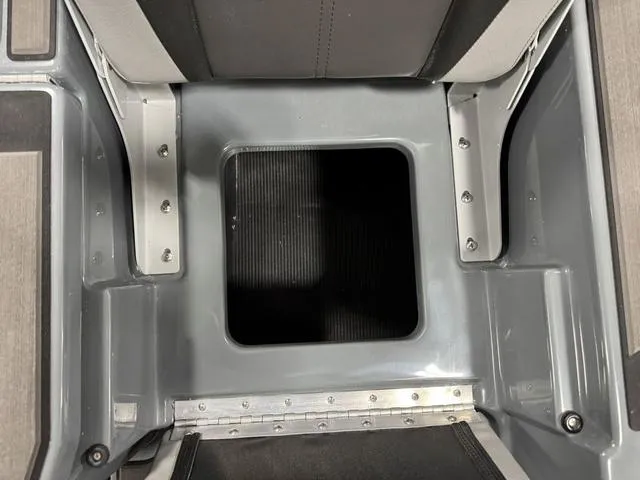 Slide: The Image of 2025 Lund 185 Impact GL Sport boat interior compartment detail. - 7