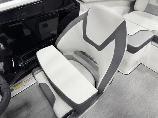 Slide: The Image of 2025 Yamaha Boats AR220 interior with modern, ergonomic seating and sleek design. - 14
