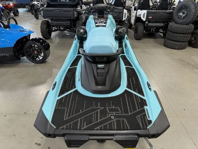 Slide: The Image of 2025 Yamaha Waverunner VX® Limited HO in showroom, featuring sleek design and vibrant blue color. - 10