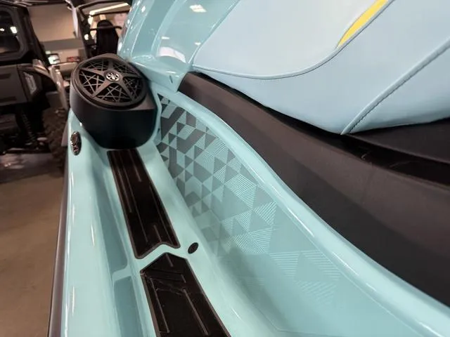 Slide: The Image of 2025 Yamaha Waverunner VX® Limited HO, light blue with geometric design and speaker detail. - 13