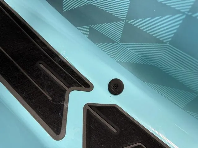 Slide: The Image of 2025 Yamaha Waverunner VX® Limited HO, close-up of blue and black textured design. - 14