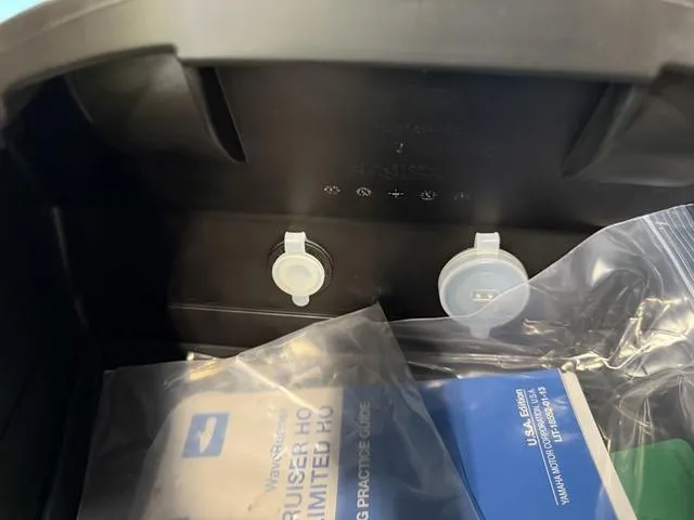 Slide: The Image of 2025 Yamaha Waverunner VX® Limited HO storage compartment with manuals and accessories. - 26