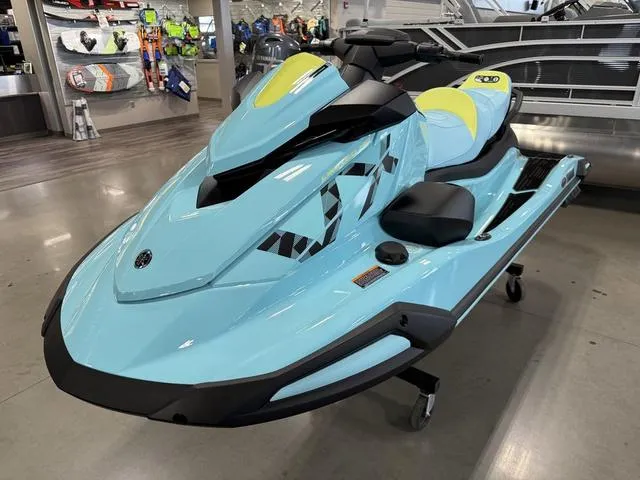 Slide: The Image of 2025 Yamaha Waverunner VX® Limited HO in showroom, sleek design, light blue color. - 4