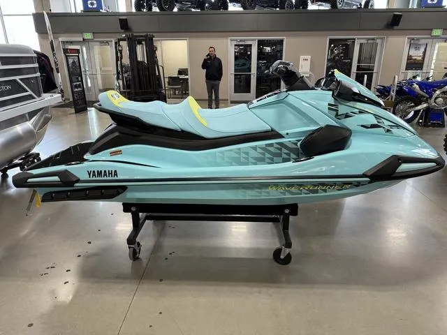 Slide: The Image of 2025 Yamaha Waverunner VX® Limited HO in showroom, light blue color, side view. - 7