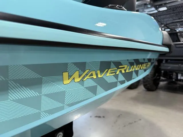 Slide: The Image of 2025 Yamaha Waverunner VX® Limited HO, close-up of turquoise body with geometric design. - 8