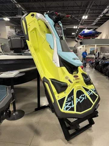 Slide: The Image of 2025 Yamaha Waverunner Jetblaster displayed vertically in a showroom. - 2