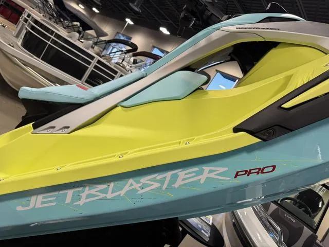 Slide: The Image of 2025 Yamaha Waverunner Jetblaster Pro in vibrant yellow and blue, showcased indoors. - 8