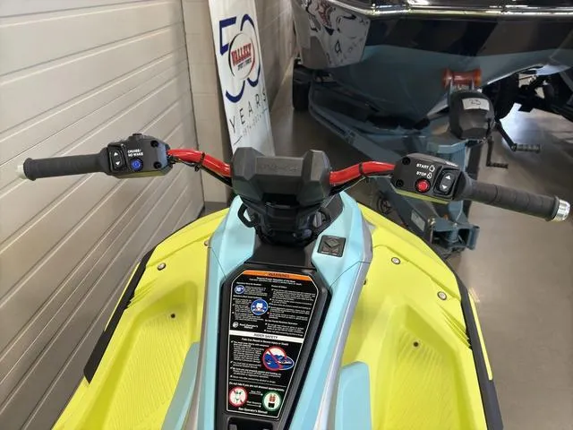 Slide: The Image of 2025 Yamaha Waverunner Jetblaster handlebars in a showroom setting. - 17