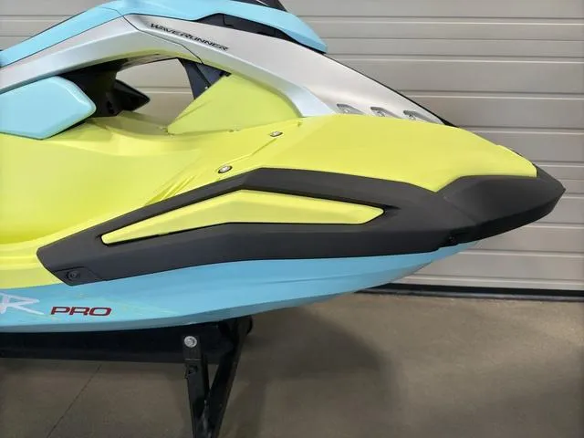 Slide: The Image of 2025 Yamaha Waverunner Jetblaster in vibrant yellow and blue, side view. - 28