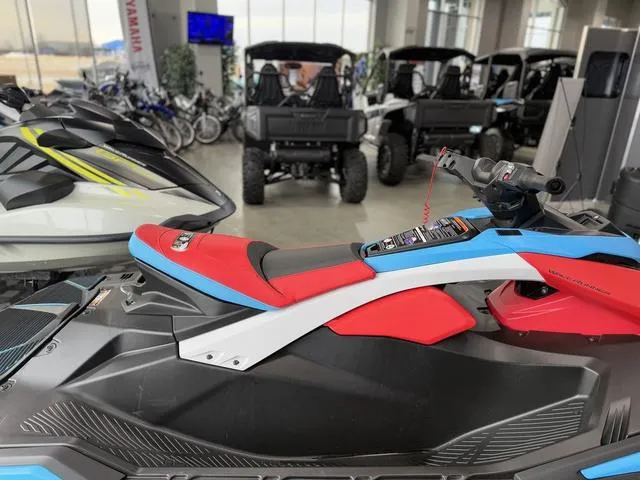 Slide: The Image of 2025 Yamaha Waverunner Jetblaster DLX 2-Up in showroom, featuring vibrant red and blue design. - 15