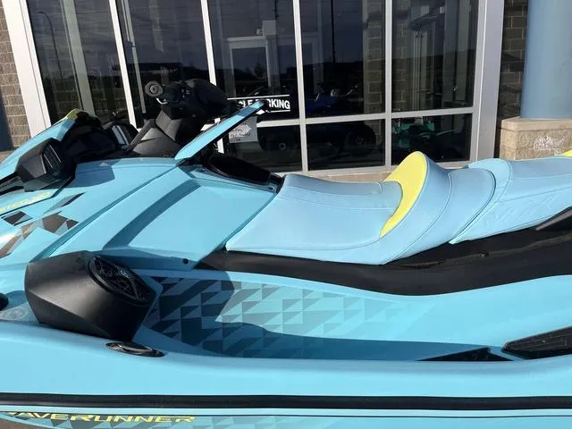 Slide: The Image of 2025 Yamaha Waverunner VX Limited HO in blue, parked outside a building. - 10