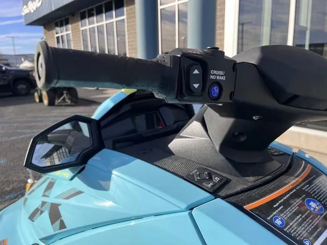 Slide: The Image of 2025 Yamaha Waverunner VX Limited HO handlebar with cruise control button, close-up view. - 11