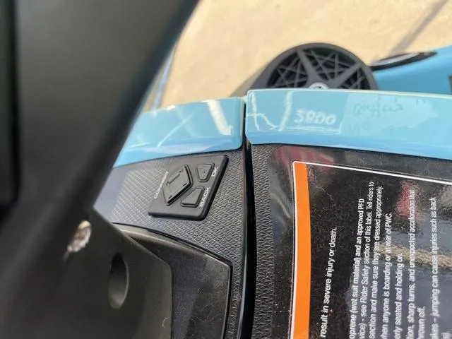 Slide: The Image of 2025 Yamaha Waverunner VX Limited HO dashboard with controls and warning label. - 13