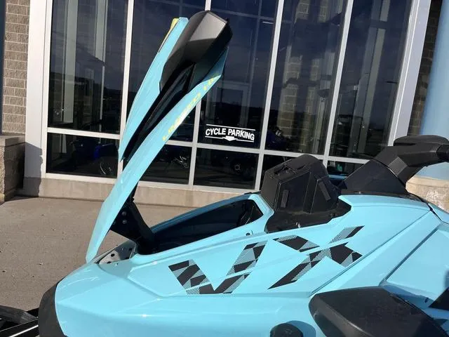 Slide: The Image of 2025 Yamaha Waverunner VX Limited HO in blue, parked near a building. - 16