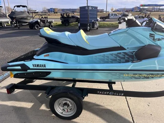 Slide: The Image of 2025 Yamaha Waverunner VX Limited HO on trailer, blue with black accents, parked outdoors. - 23