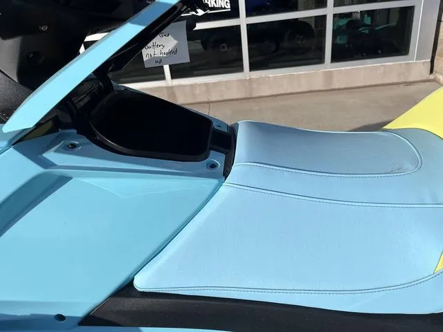 Slide: The Image of 2025 Yamaha Waverunner VX Limited HO in light blue, showcasing seat and storage compartment. - 9