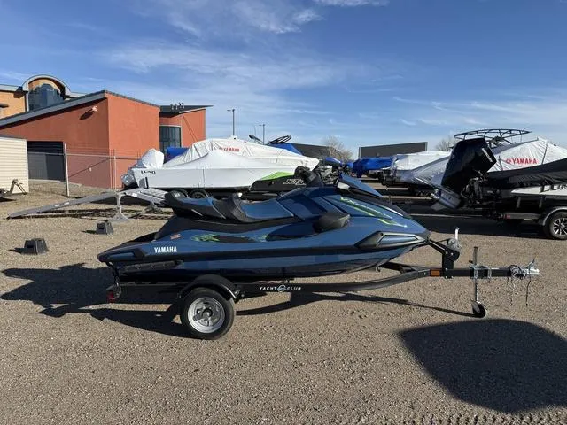 Slide: The Image of 2025 Yamaha WaveRunner VX Cruiser® HO with Audio on trailer, parked outdoors. - 1