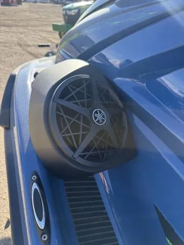 Slide: The Image of 2025 Yamaha WaveRunner VX Cruiser® HO with Audio, featuring sleek blue design and integrated speaker. - 4