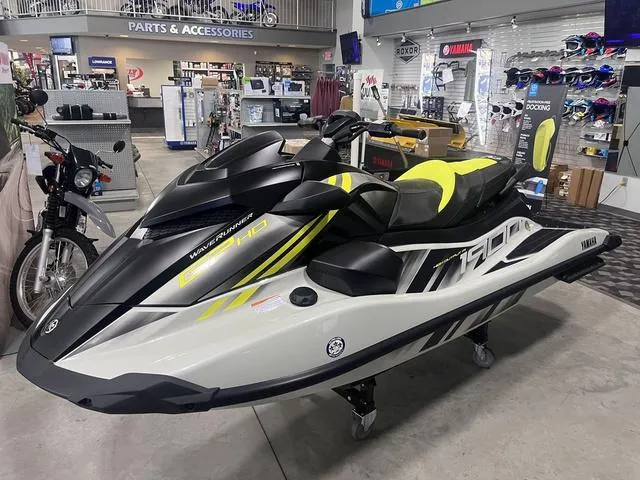 Slide: The Image of 2025 Yamaha Waverunner GP HO™ with Audio in showroom, featuring sleek design and vibrant accents. - 3