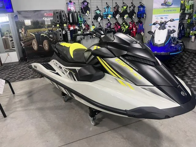 Slide: The Image of 2025 Yamaha Waverunner GP HO™ with Audio in showroom, featuring sleek design and vibrant colors. - 4