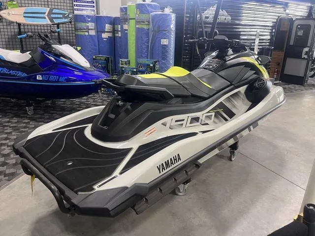 Slide: The Image of 2025 Yamaha Waverunner GP HO™ with Audio, sleek design in showroom setting. - 5