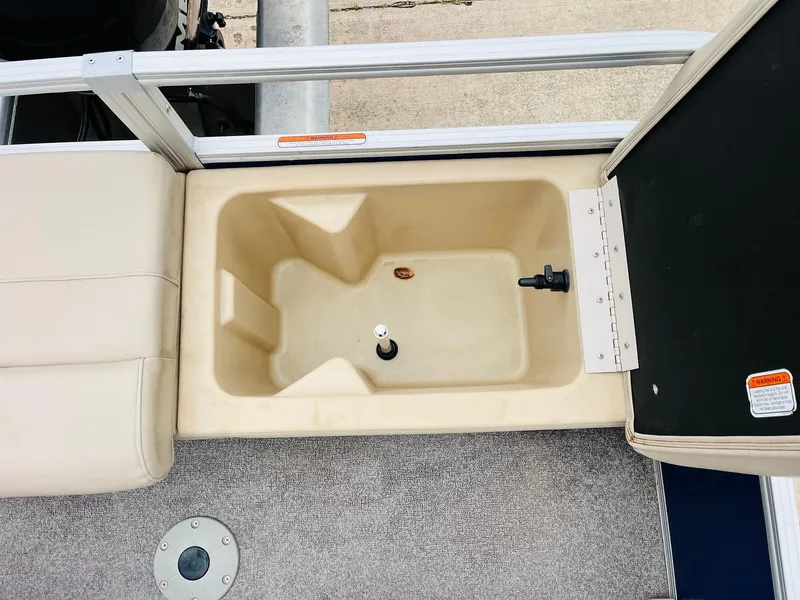 Slide: The Image of 2017 Sun Tracker Fishin' Barge 22 XP3 livewell with beige interior and seating. - 41