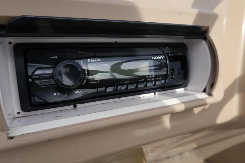 Slide: The Image of Sony Bluetooth stereo system in a 2016 Bennington 22 SLX boat console. - 15