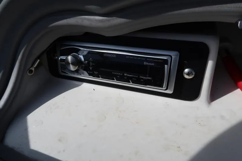 Slide: The Image of Kenwood stereo system in 2004 Yamaha Boats SX 230, featuring Bluetooth connectivity. - 16