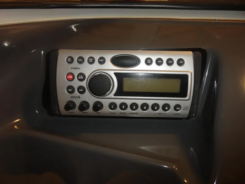 Slide: The Image of Boat stereo system in a 2005 Campion Chase 550I BR dashboard. - 12