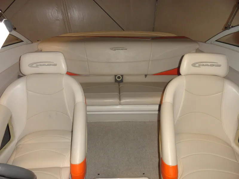 Slide: The Image of 2005 Campion Chase 550I BR boat interior with beige and orange seating. - 15