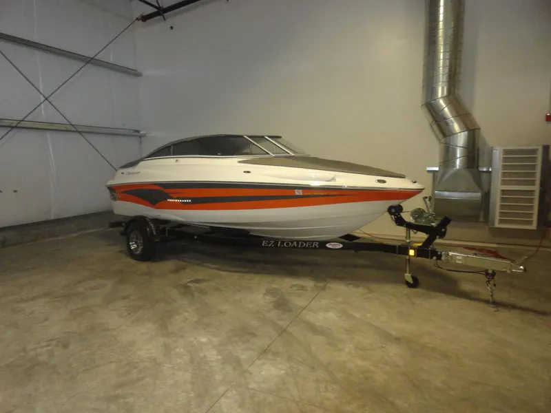 Slide: The Image of 2005 Campion Chase 550I BR boat in indoor storage on trailer. - 20