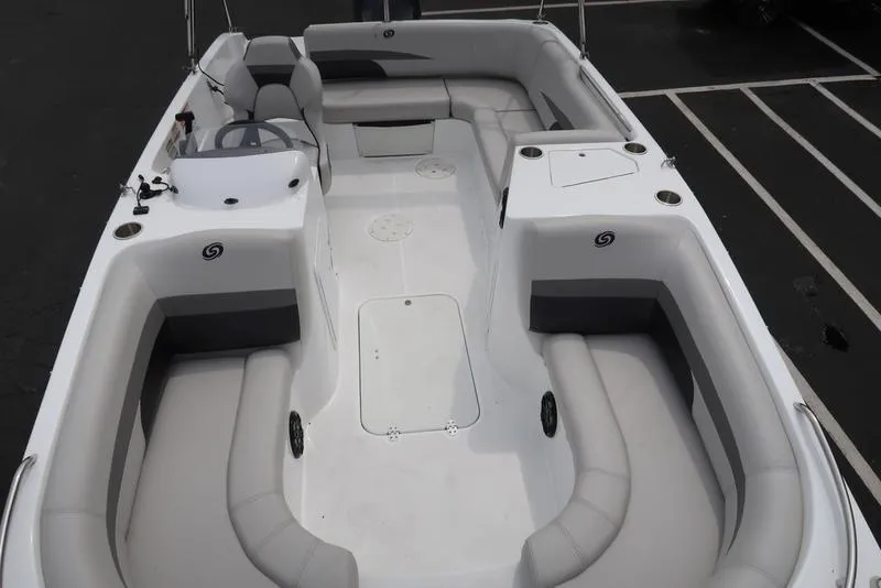 Slide: The Image of 2023 Hurricane SunDeck Sport 188 OB boat with spacious seating and modern design. - 2
