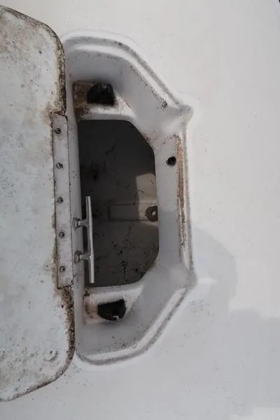 Slide: The Image of Open storage compartment on 2023 Hurricane SunDeck Sport 188 OB boat. - 24