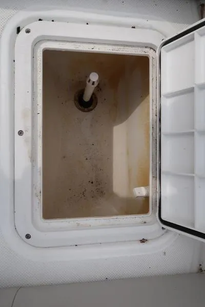 Slide: The Image of Open storage compartment on 2023 Hurricane SunDeck Sport 188 OB boat. - 25