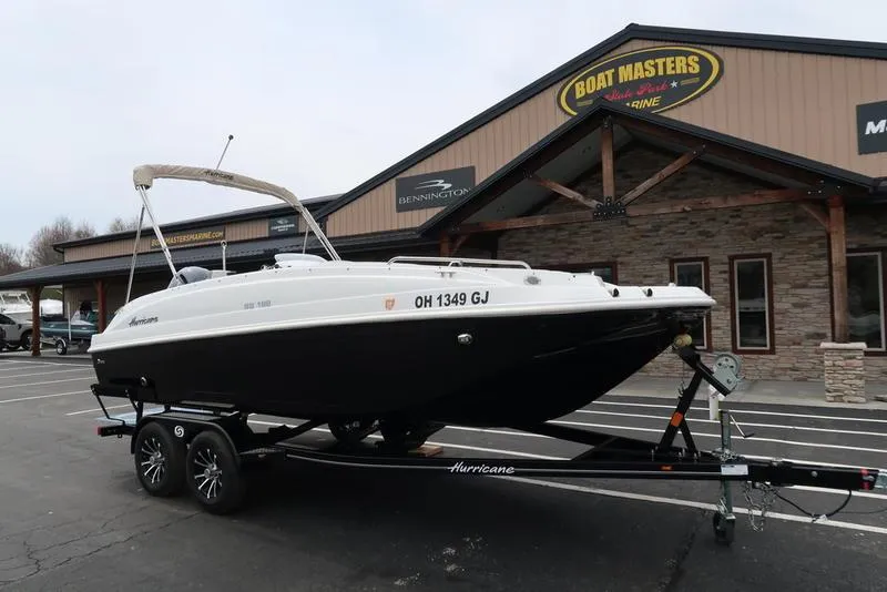 Slide: The Image of 2023 Hurricane SunDeck Sport 188 OB boat on trailer outside dealership. - 3