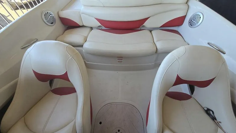 Slide: The Image of Interior of 2014 Tahoe Q5i boat with white and red seating. - 9