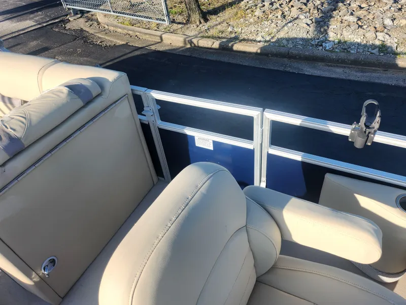 Slide: The Image of 2018 SunChaser Geneva Cruise 22 DLX 4.0 Fish boat with beige seating and railing. - 12