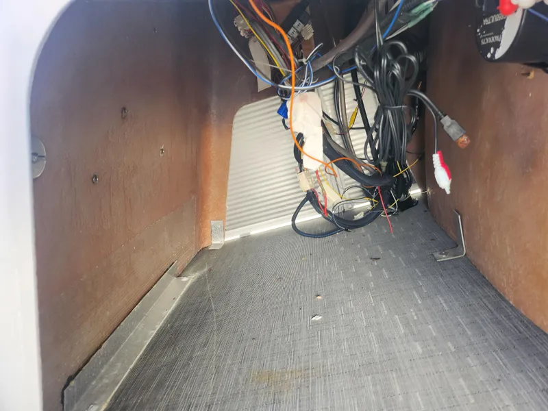 Slide: The Image of Interior wiring of a 2022 Bennington S 22 L-Bench boat. - 16